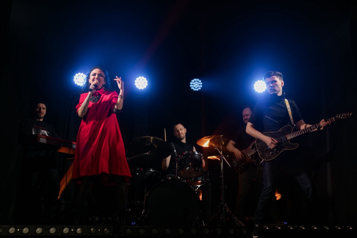 K-pop artist at international concert with diverse audience