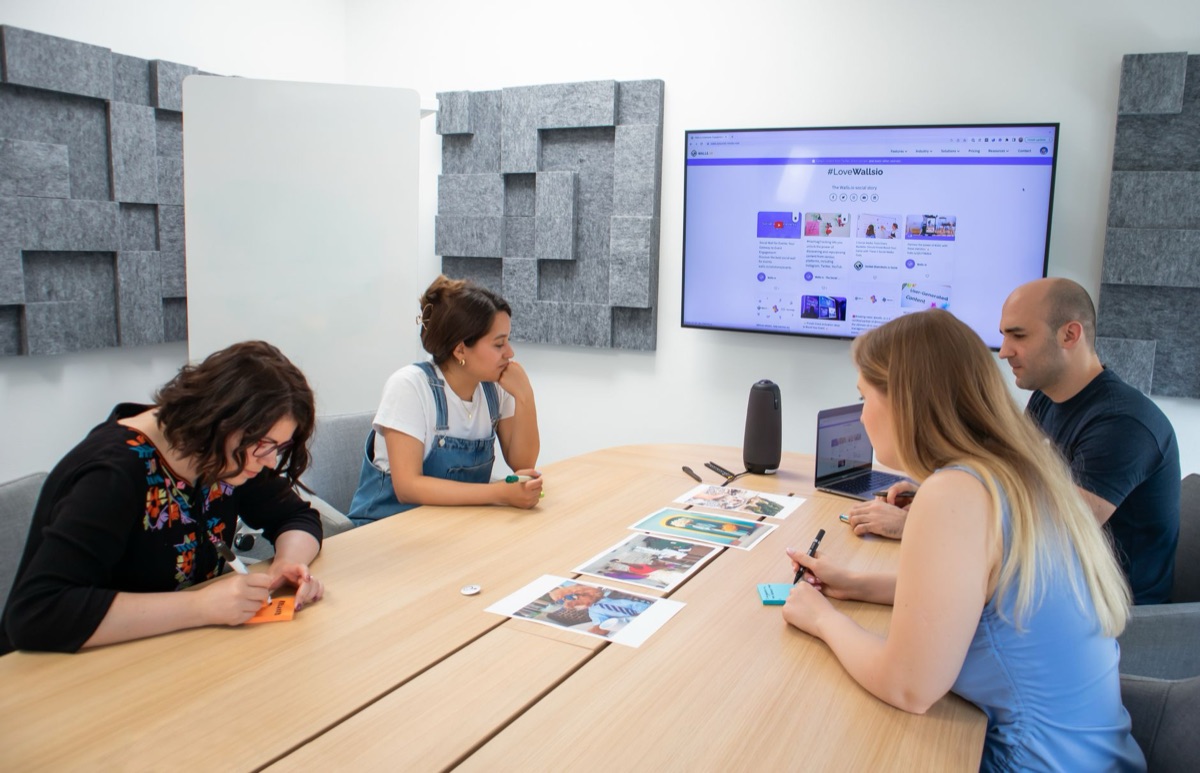 K-artist team collaboration in conference room