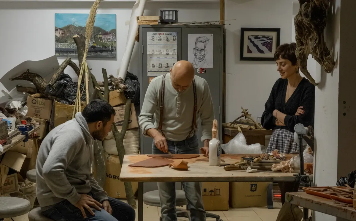 Craftspeople focus on creating art in a workshop in Zonguldak, Türkiye.